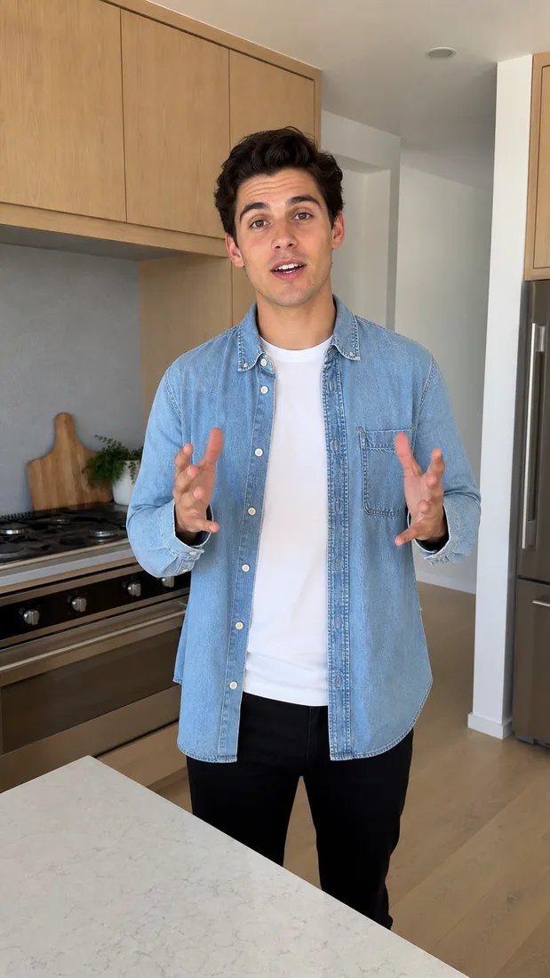 Presenter standing in a bright interior